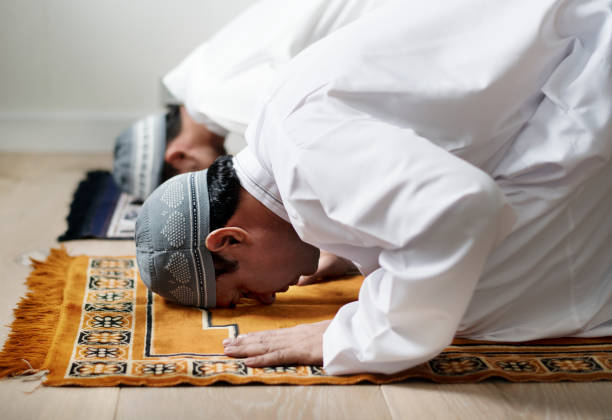 Muslim men praying during Ramadan